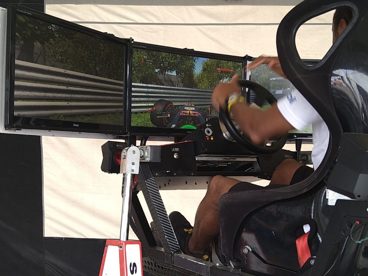 Take a seat in our moving car simulator and experience the thrill of driving!